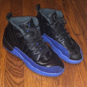 Used- Retro Jordan 12 black and blue kids size 3Y